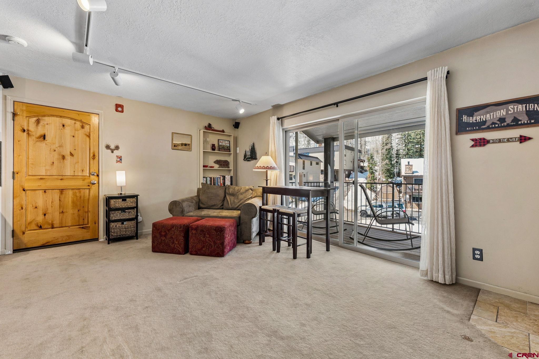 395 Sheol Street, Unit 117 Durango, CO 81301 - Photo 4 of 28 a living room with furniture