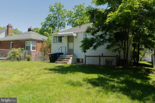 a house view with a garden space