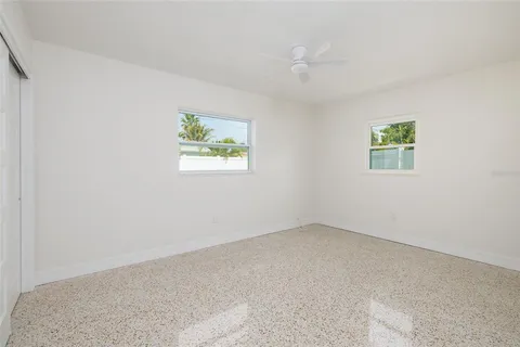 an empty room with windows