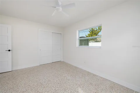an empty room with windows