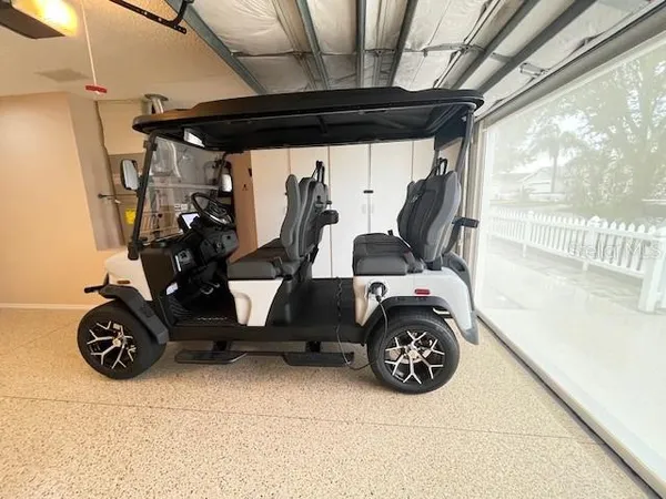 a view of a garage with parked cars