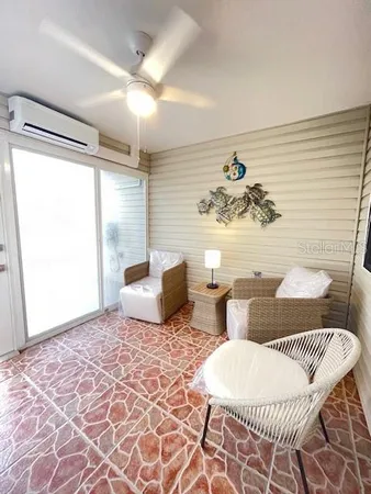 a bedroom with double bed and a window