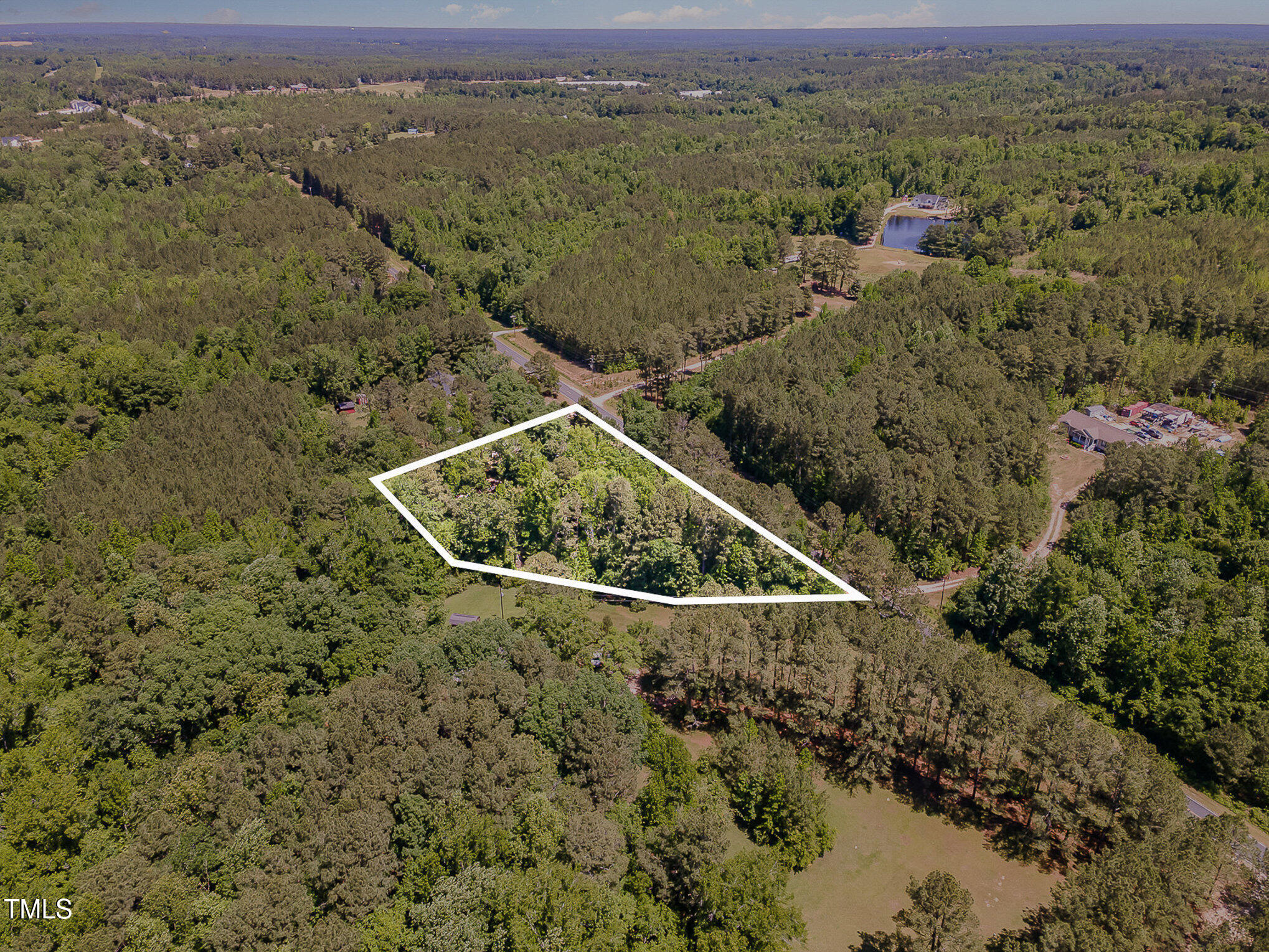 1510 Walker Road Linden, NC 28356 - Photo 2 of 8 an aerial view of house with yard