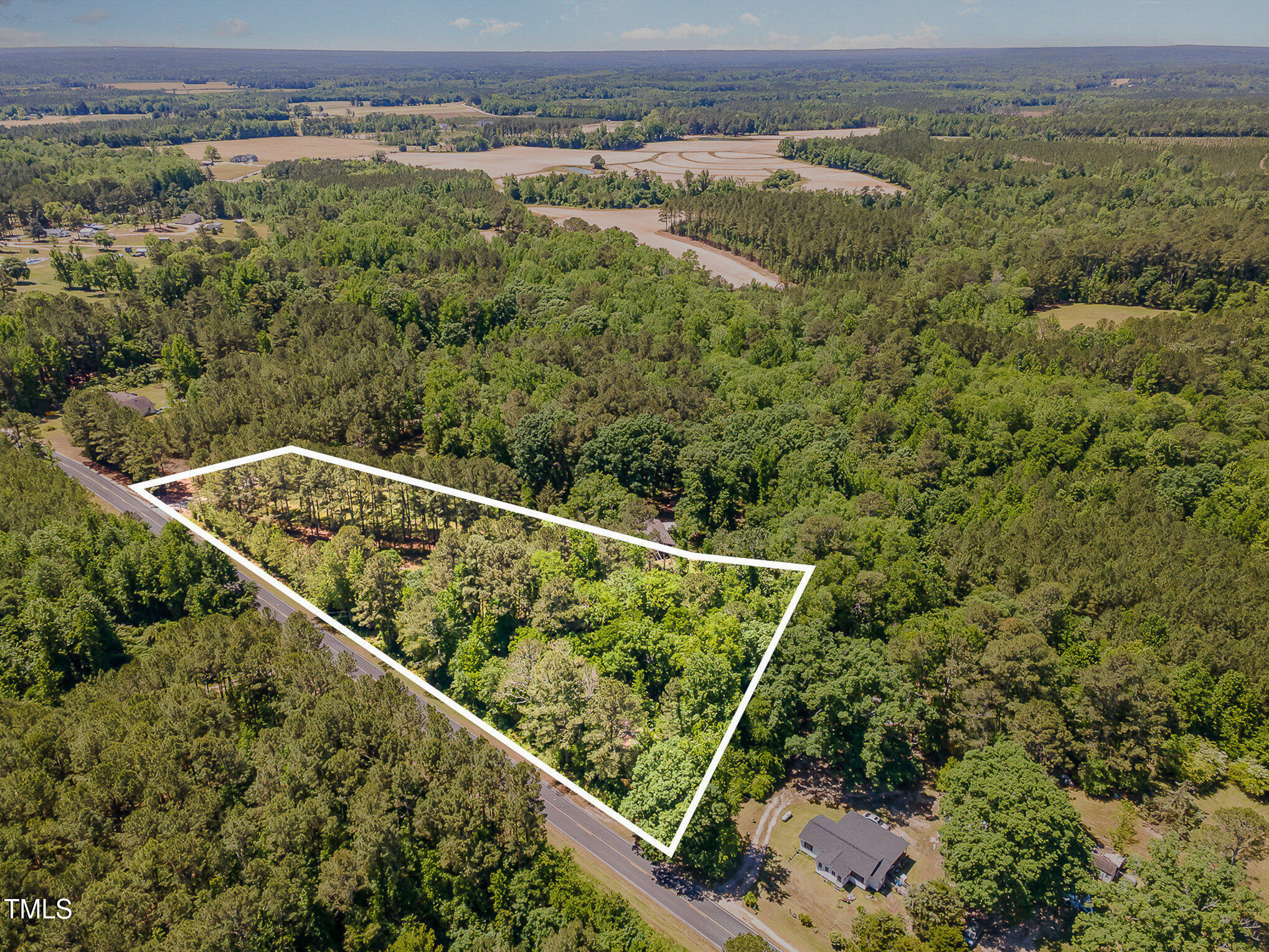1510 Walker Road Linden, NC 28356 - Photo 3 of 8 an aerial view of a house with a yard