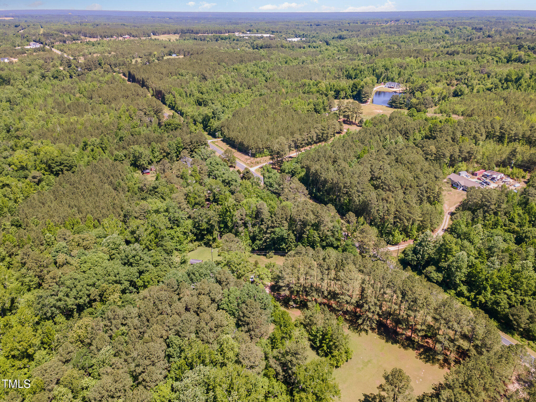1510 Walker Road Linden, NC 28356 - Photo 7 of 8 a view of a city with green field