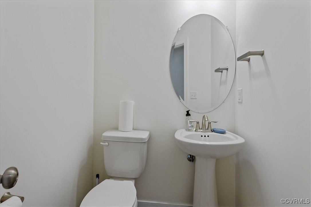 4086 Newville Road Waverly, VA 23890 - Photo 17 of 45 Bathroom with sink and toilet