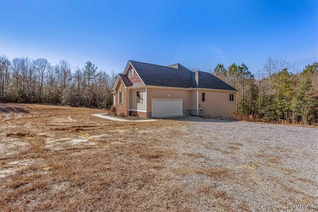 4086 Newville Road Waverly, VA 23890 - Photo 32 of 45 View of side of property with a garage