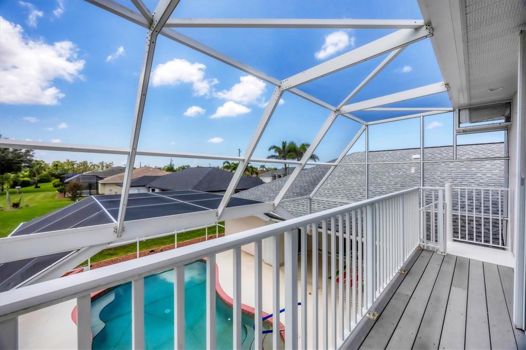 63 Clubhouse Road Rotonda West, FL 33947 - Photo 22 of 44 a view of deck with patio