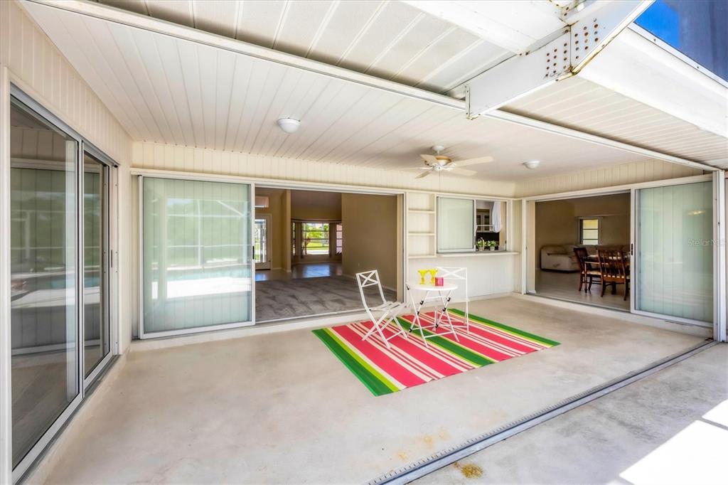 63 Clubhouse Road Rotonda West, FL 33947 - Photo 26 of 44 a room with pool table and a window