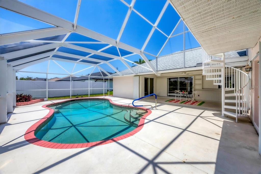 63 Clubhouse Road Rotonda West, FL 33947 - Photo 29 of 44 a room with pool and table