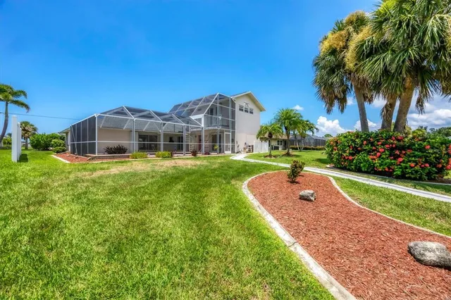 a backyard of a house with lots of green space