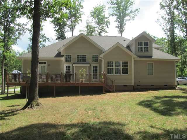 109 Rivers Edge Court Timberlake, NC 27583 - Photo 18 of 18 a front view of a house with a yard