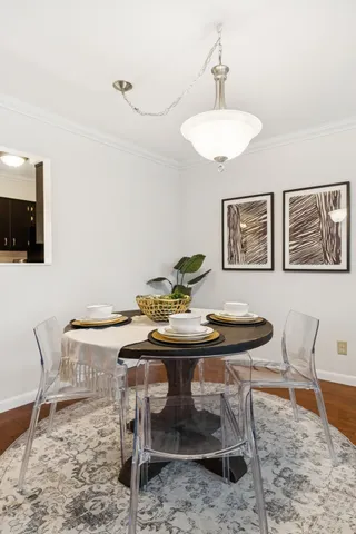 a view of a dining room with furniture
