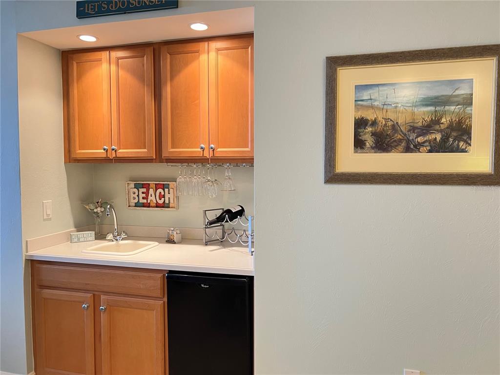 3321 Sunset Key Circle, Unit 308 Punta Gorda, FL 33955 - Photo 23 of 66 a bathroom with a sink vanity and a mirror