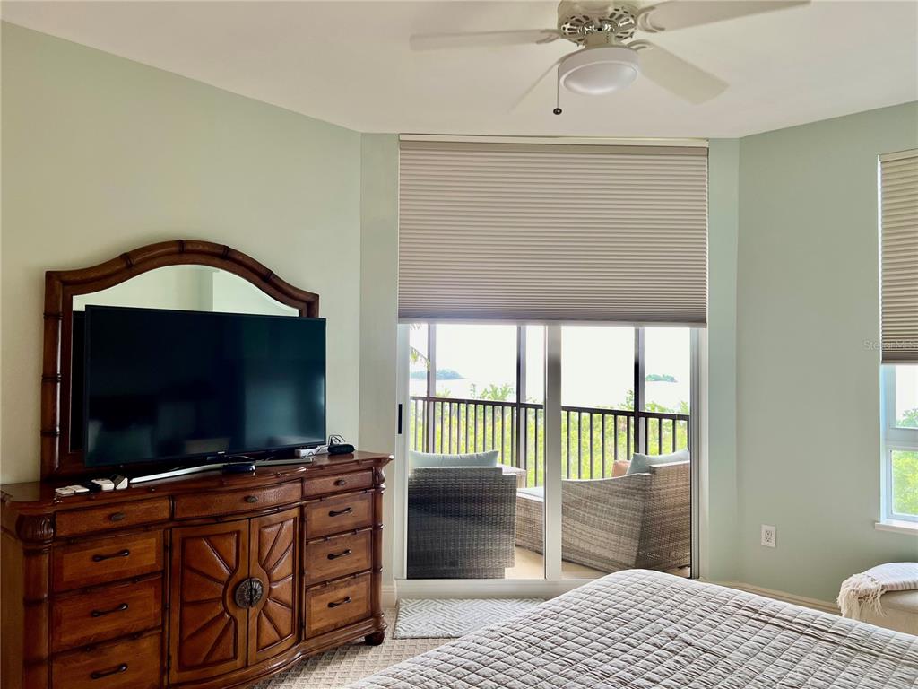 3321 Sunset Key Circle, Unit 308 Punta Gorda, FL 33955 - Photo 26 of 66 a living room with furniture and a flat screen tv