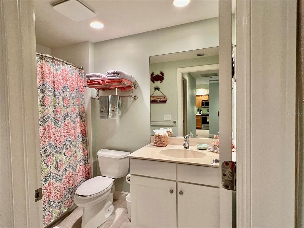 3321 Sunset Key Circle, Unit 308 Punta Gorda, FL 33955 - Photo 36 of 66 a bathroom with a sink toilet and shower