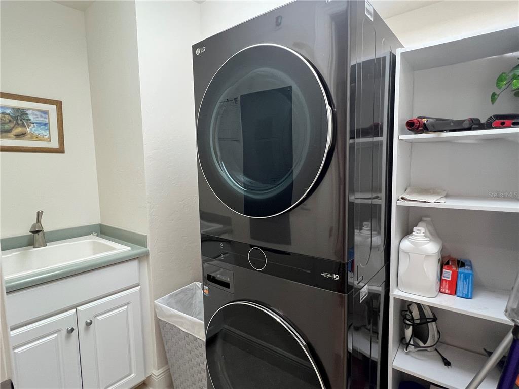 3321 Sunset Key Circle, Unit 308 Punta Gorda, FL 33955 - Photo 37 of 66 a utility room with dryer and washer