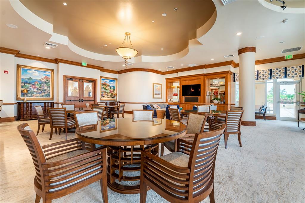 3321 Sunset Key Circle, Unit 308 Punta Gorda, FL 33955 - Photo 41 of 66 a view of a dining room with furniture window and outside view