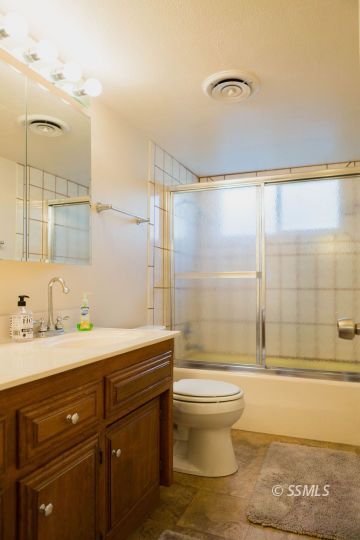 712 Peg Street Ridgecrest, CA 93555 - Photo 17 of 44 a bathroom with a sink toilet and shower