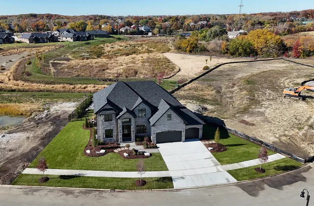 a house with river in front of it