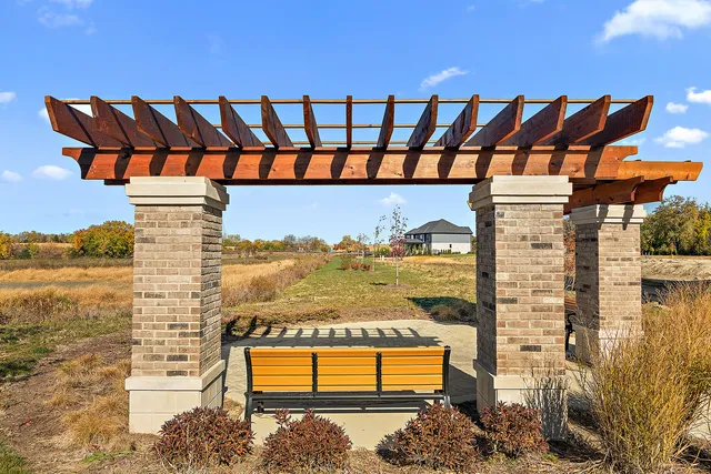a view of swimming pool with outdoor seating