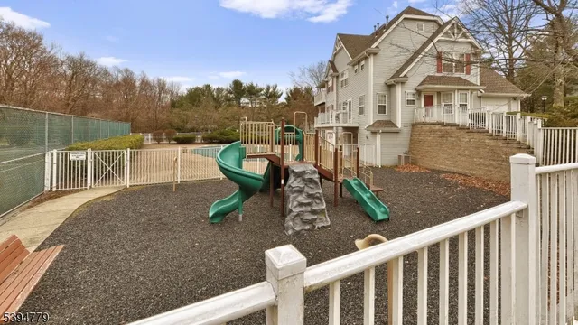 a view of a house with backyard porch and sitting area