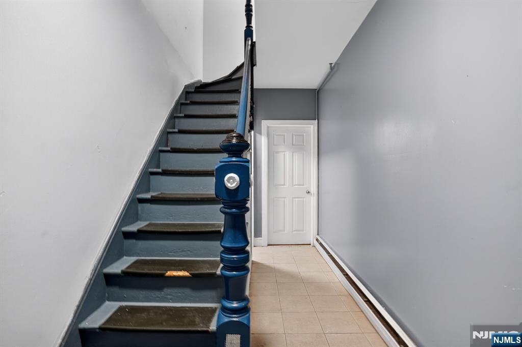 1110 Hampton Place Elizabeth, NJ 07201 - Photo 13 of 23 a view of entryway with wooden floor