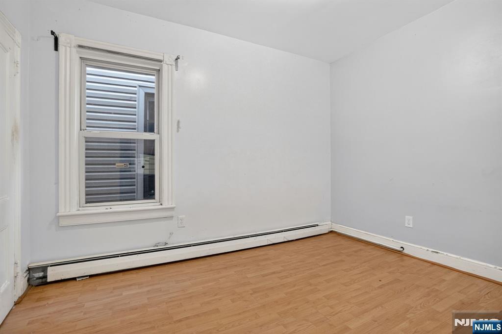 1110 Hampton Place Elizabeth, NJ 07201 - Photo 16 of 23 a view of an empty room with a window