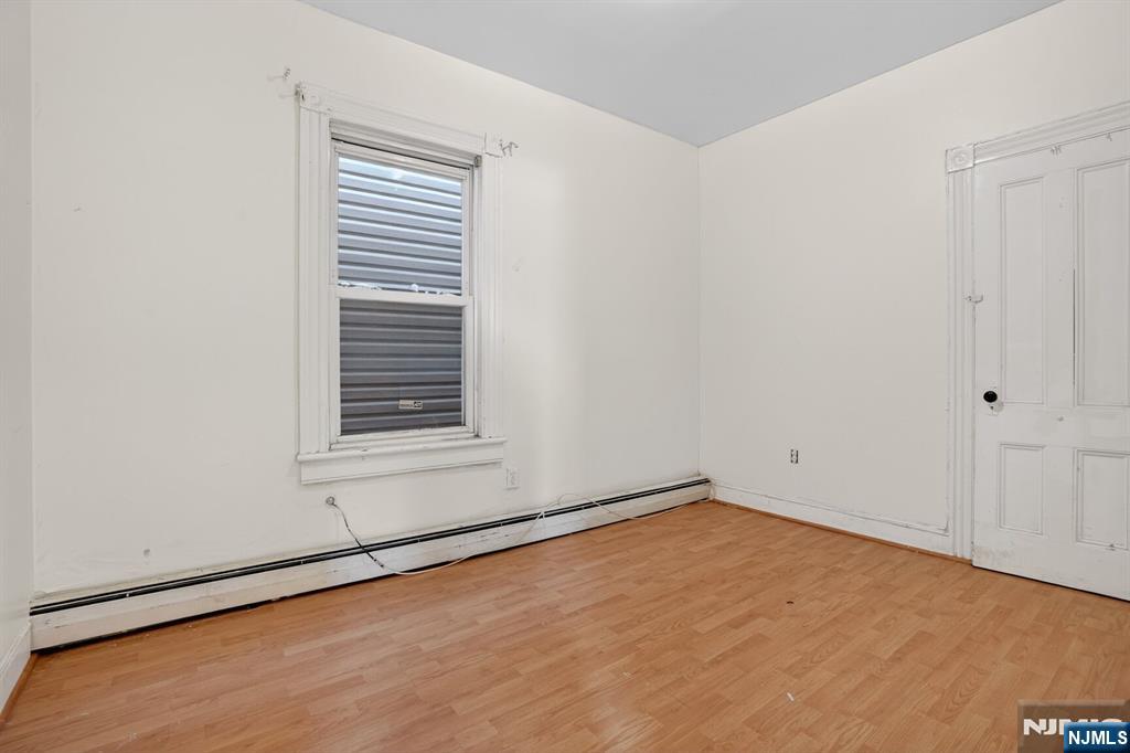 1110 Hampton Place Elizabeth, NJ 07201 - Photo 18 of 23 a view of an empty room with a window