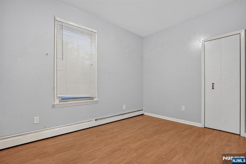 1110 Hampton Place Elizabeth, NJ 07201 - Photo 2 of 23 an empty room with a window
