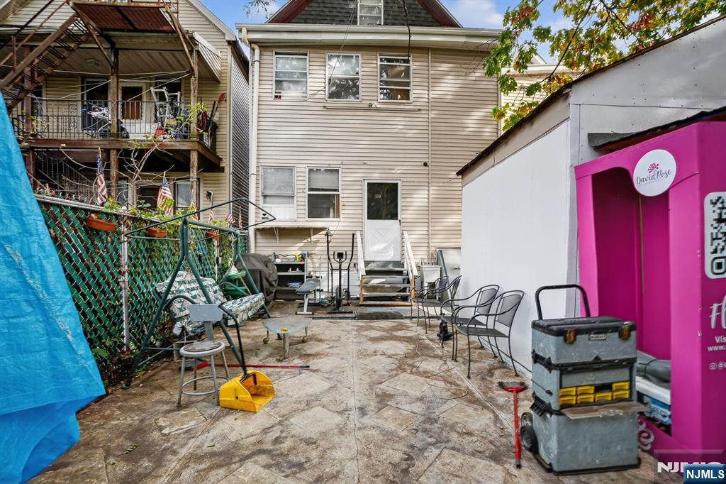 1110 Hampton Place Elizabeth, NJ 07201 - Photo 23 of 23 a view of a chairs and table in the patio