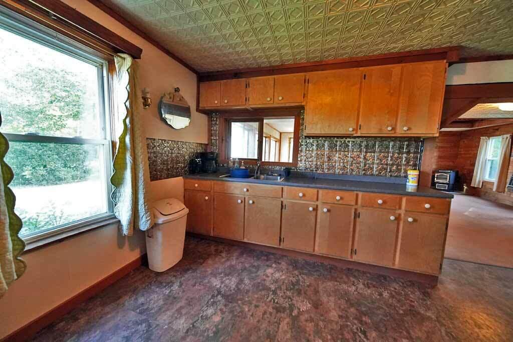 1378 Bancroft Road Wytopitlock, ME 04497 - Photo 18 of 55 kitchen-to-living-room