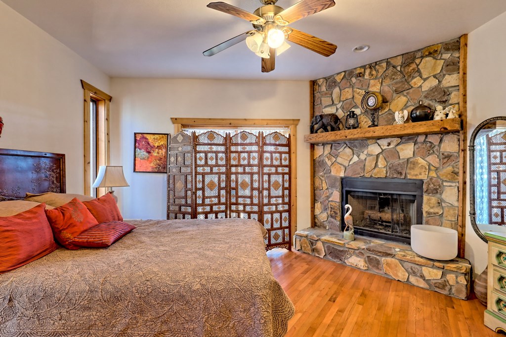 601 Sierra Circle Murphy, NC 28906 - Photo 11 of 87 a living room with furniture a fireplace and a flat screen tv