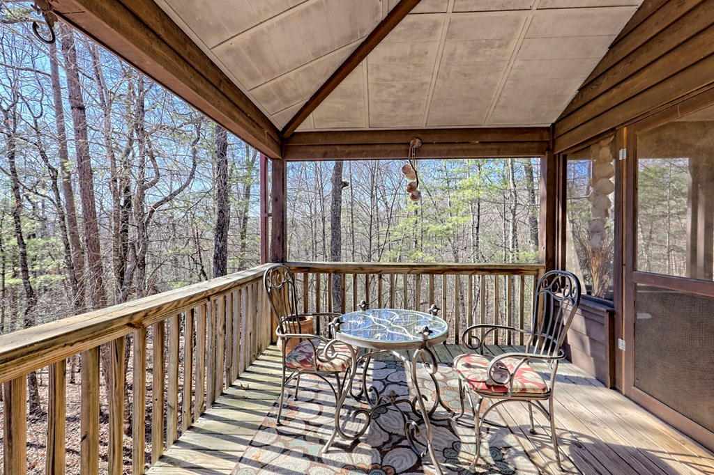 601 Sierra Circle Murphy, NC 28906 - Photo 55 of 87 a view of a chair and table in the balcony