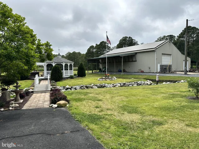 a view of balcony with furniture and wooden floor