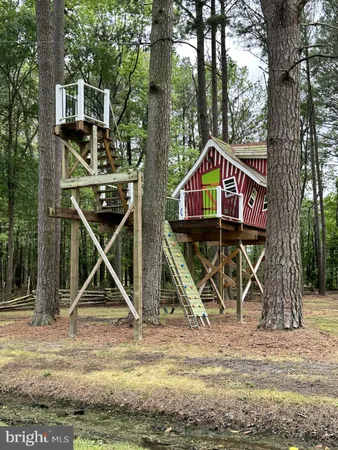 a view of livingroom with washer and dryer
