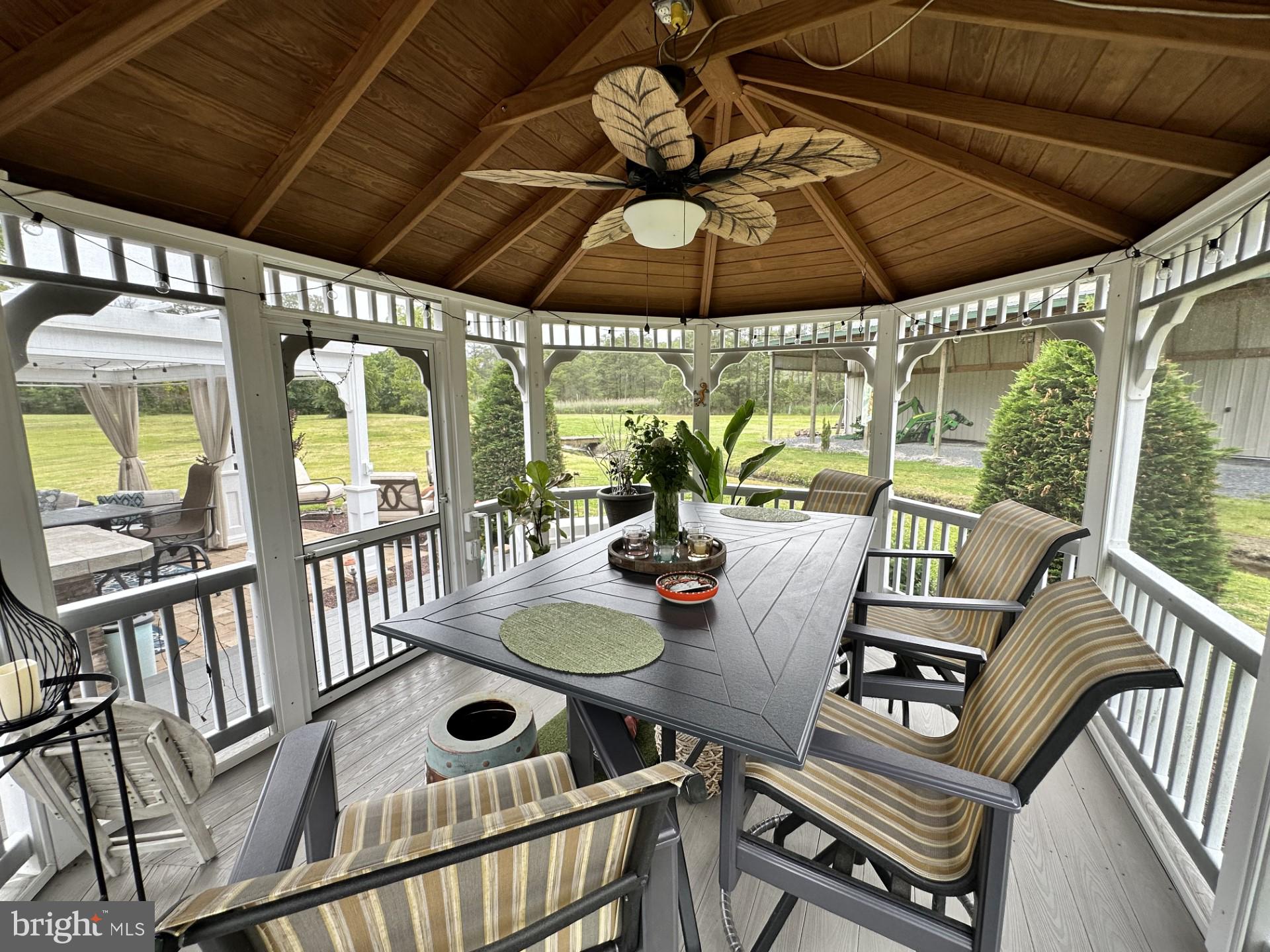 26463 Asbury Avenue Crisfield, MD 21817 - Photo 24 of 94 a view of balcony with furniture and wooden floor