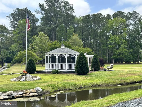 a view of a kitchen with furniture and a window