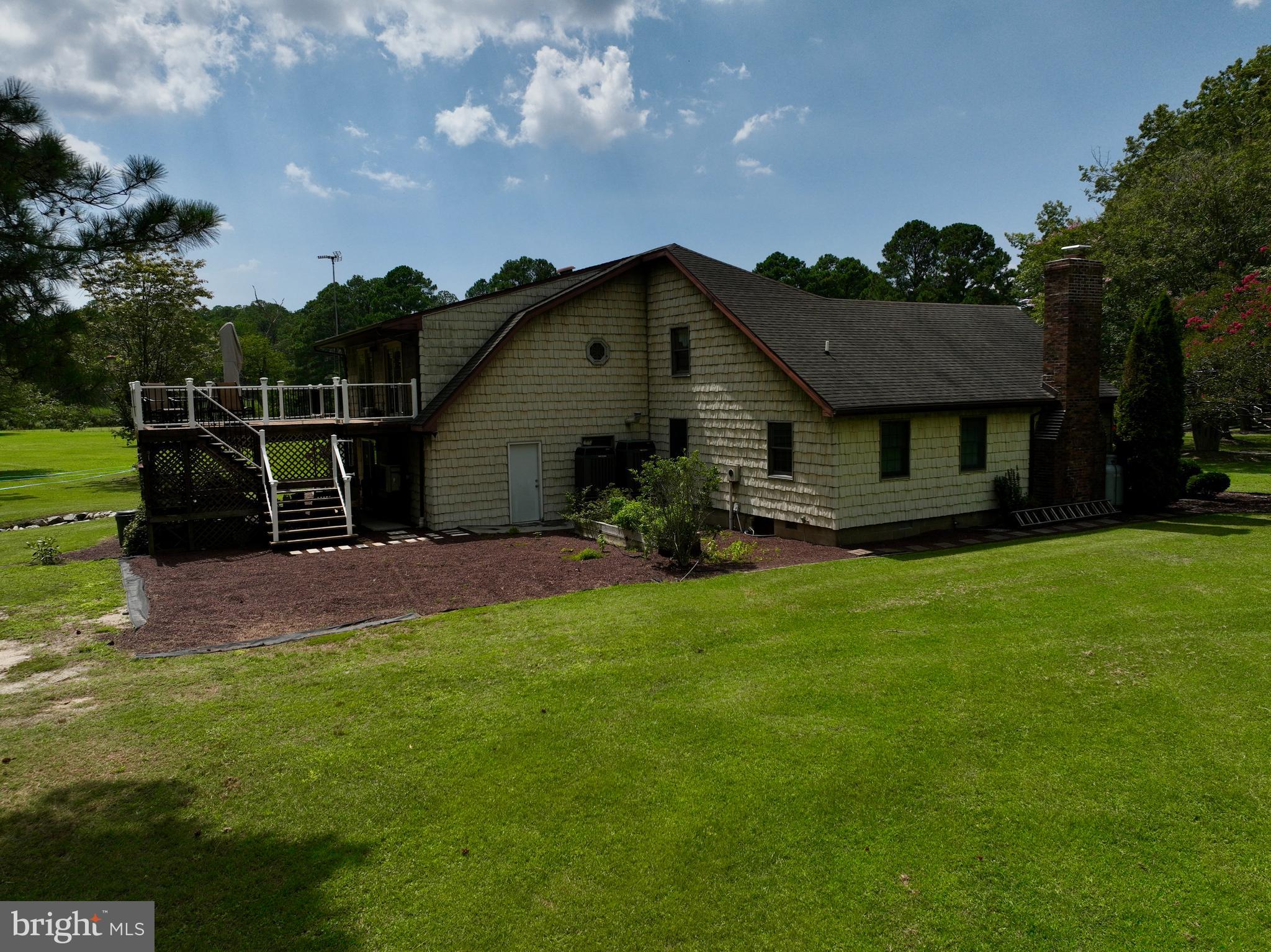 26463 Asbury Avenue Crisfield, MD 21817 - Photo 78 of 94 a house view with a garden space