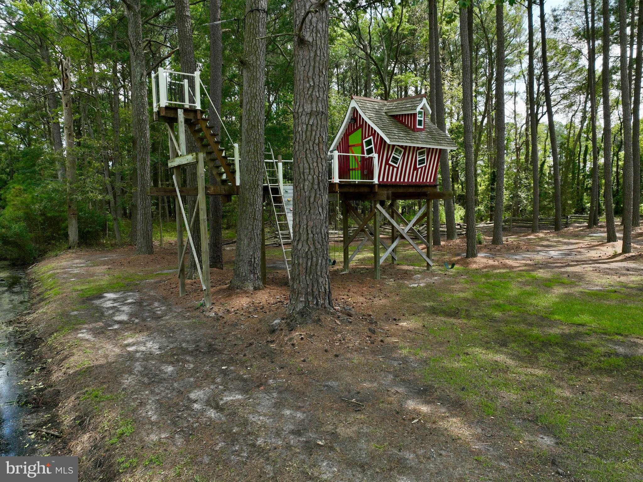 26463 Asbury Avenue Crisfield, MD 21817 - Photo 79 of 94 a sign that is on the side of the road