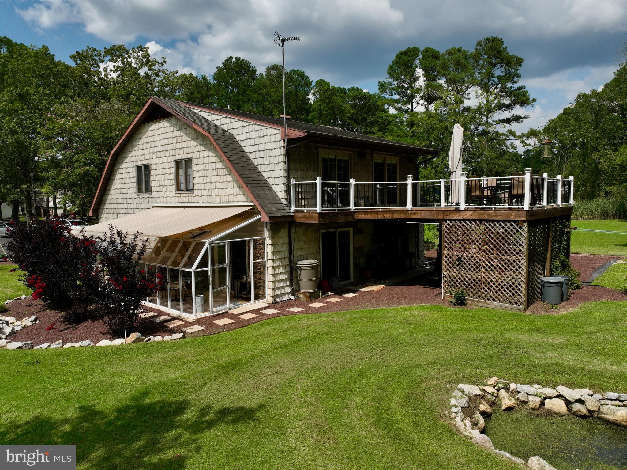 26463 Asbury Avenue Crisfield, MD 21817 - Photo 82 of 94 a front view of a house with garden