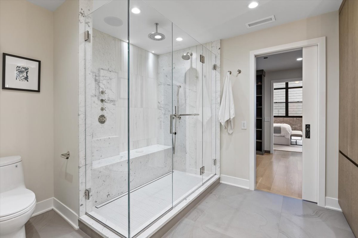 850 West Adams Street, Unit 7E Chicago, IL 60607 - Photo 15 of 27 a bathroom with a shower and a toilet