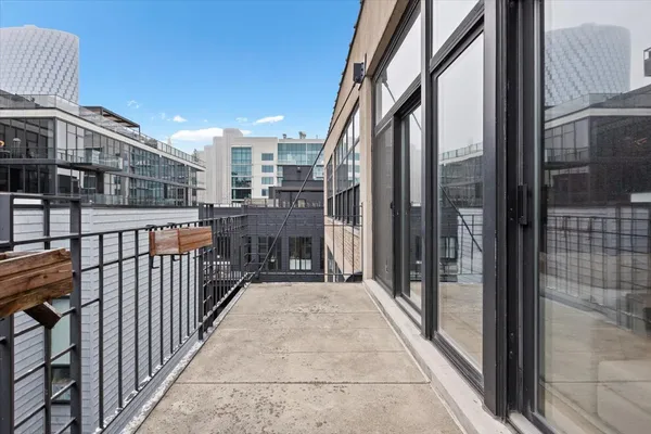 a view of a balcony with city view