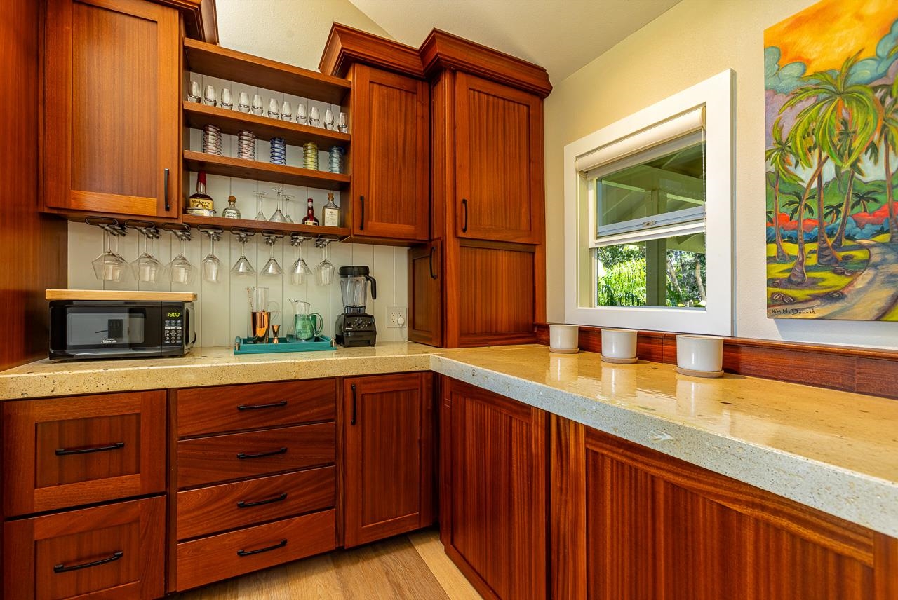 555 North Holokai Road Haiku, HI 96708 - Photo 14 of 50 A convenient beverage & appliance bar in the pantry is also detailed with specially designed