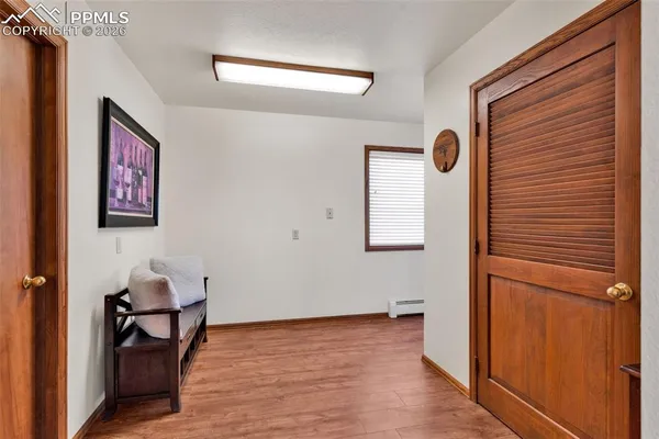 a view of a elevator and a mirror