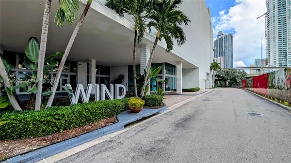 a view of potted plants in front of building