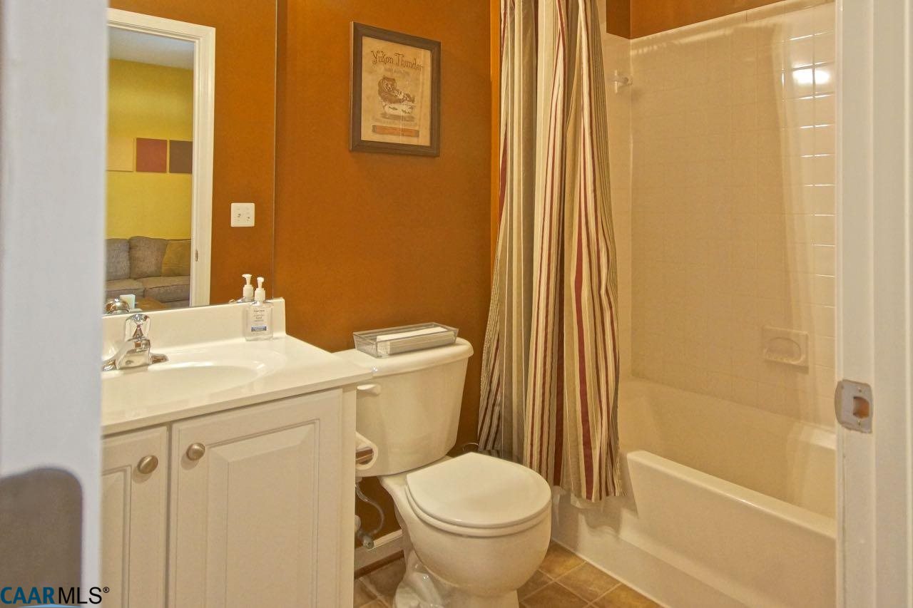 813 Rainier Road Charlottesville, VA 22903 - Photo 13 of 18 a bathroom with a sink and a toilet