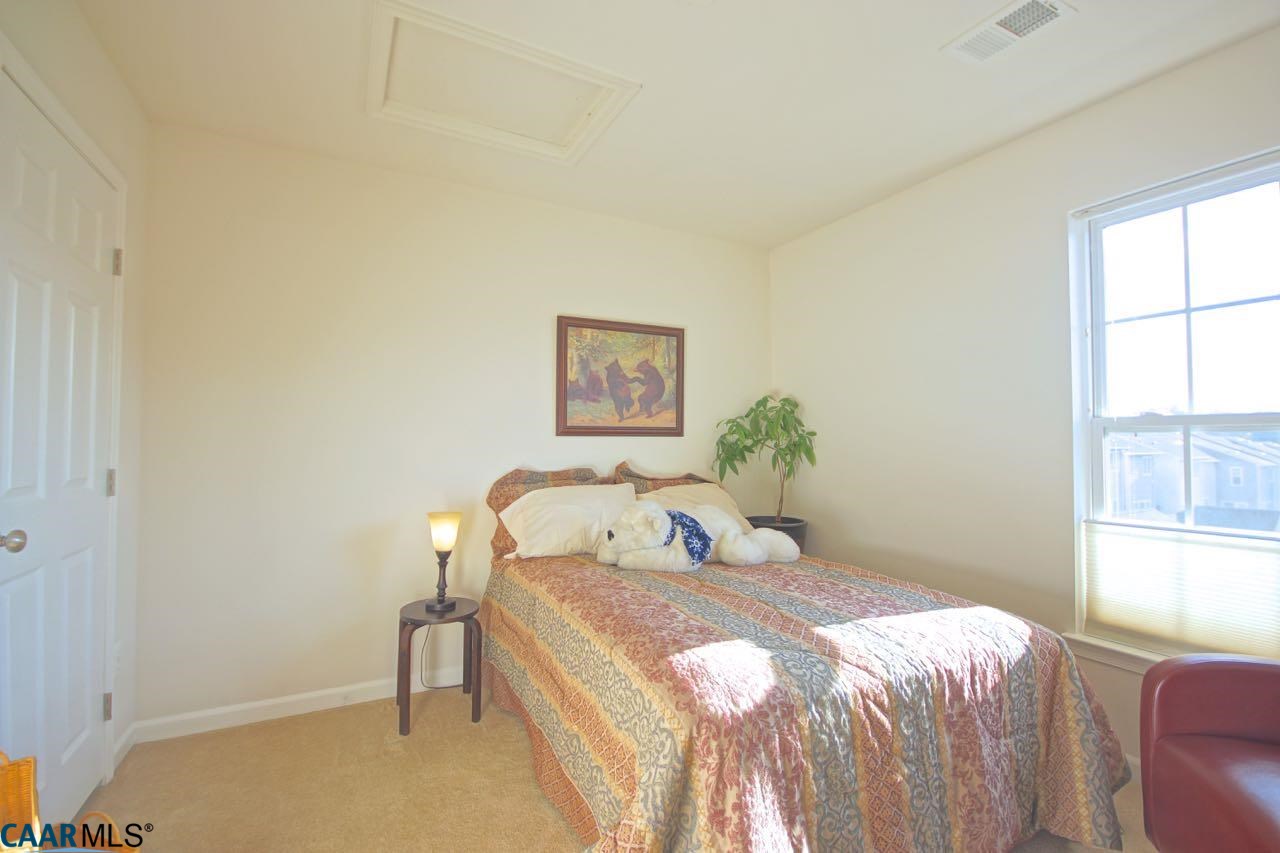 813 Rainier Road Charlottesville, VA 22903 - Photo 10 of 18 a bedroom with a bed and a window