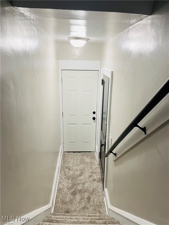 2511 4th Street Northwest Canton, OH 44708 - Photo 9 of 20 Staircase featuring carpet floors and baseboards