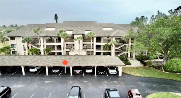 a table and chairs in front of a building
